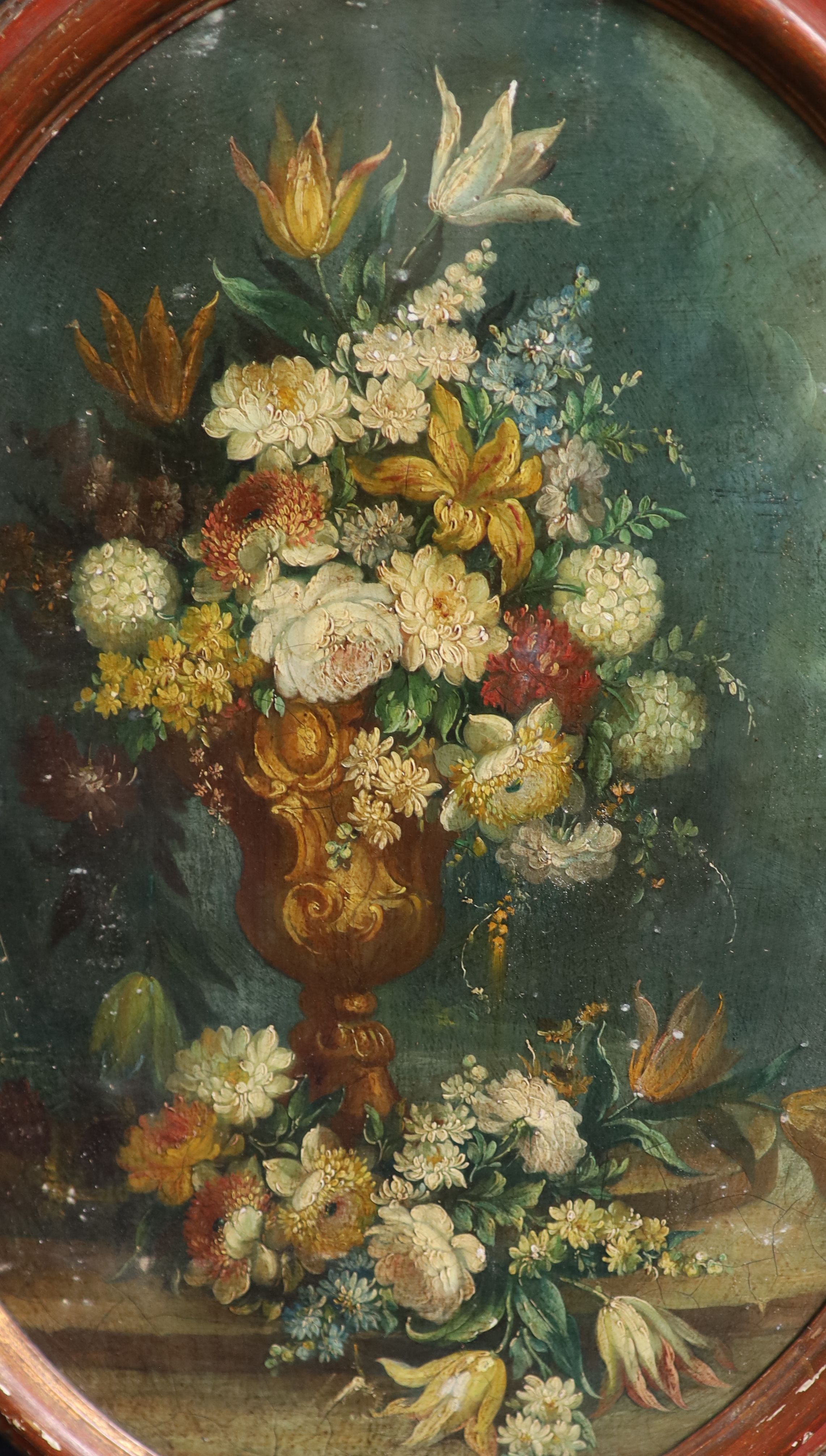 19th century Italian School , Still lifes of flowers in vases, an arch and water beyond, pair of oils on wooden panels, ovals, 65 x 47cm